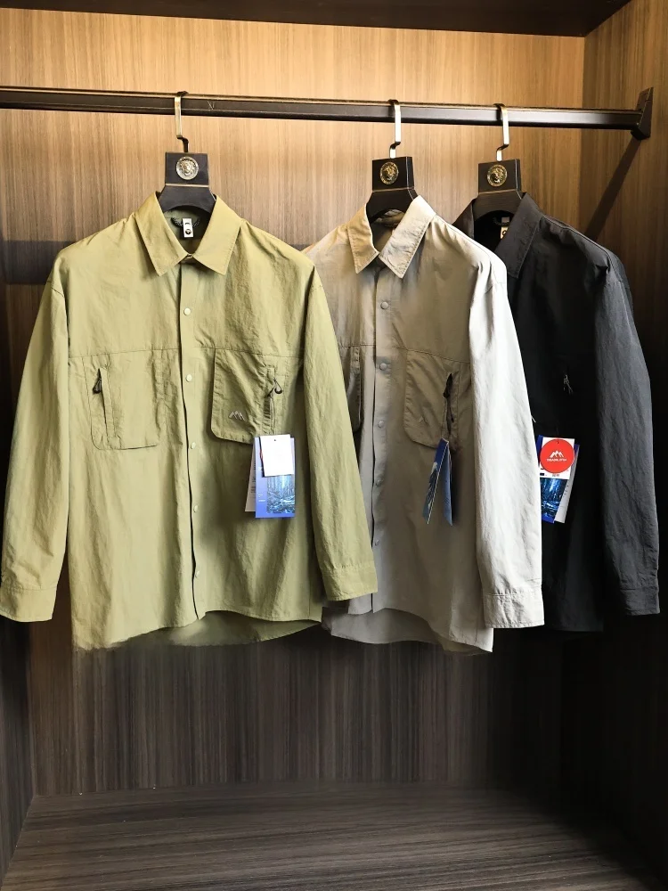 

Outdoor Men's Loose Fit irt Jaet Stand Sle Long Sve Pure Color Qui Dry Sun Protection Spring Faion Urban Casual