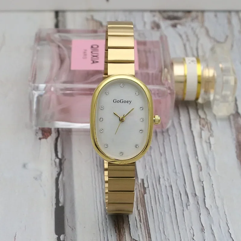 

Women Quartz Watch Luxury Oval Shaped Fashion Gold Case Small Roman Numeral Dial Female Full Metal Band Reloj Niche Wristwatch