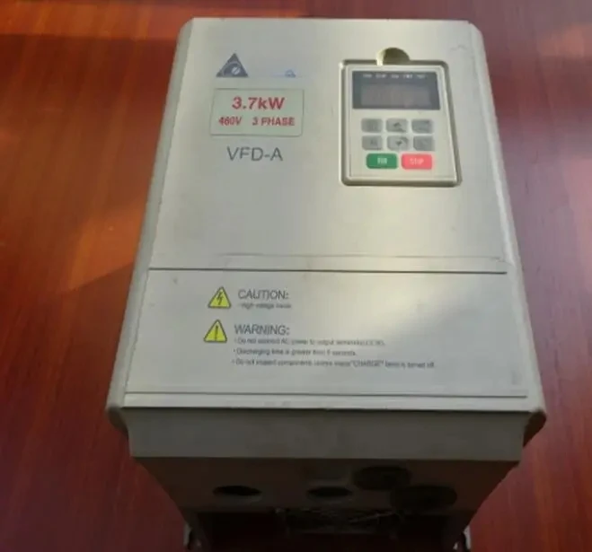 VFD037A43A  3.7KW   inverter  ,     In good working condition, free shipping   A