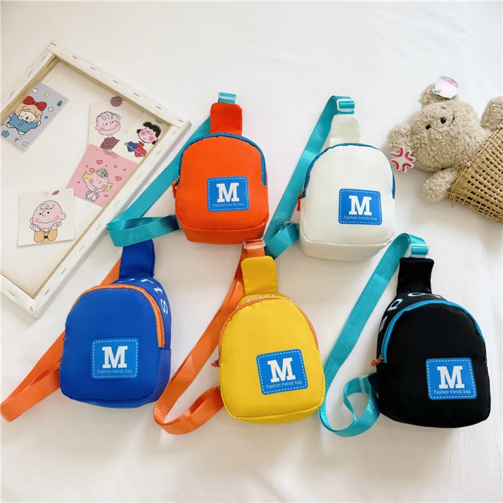 

Kids Boy Girl Breast Crossbody Bag Letter M Zipper Sports Candy Color Shoulder Bag Travel Outdoor Cash Coin Phone Crossbody Bag