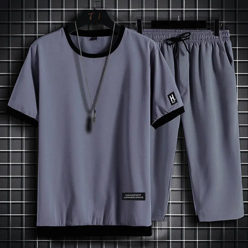 

Men's Summer Casual Sport Suit Loose Fit ort Sve T-irt And Seven-Foot Pants Breathable Sweat Absorbent Large Size