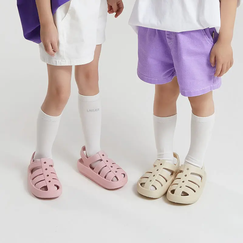 サンダル Children Roman Sandals Summer Breathable Hollow Out Kids Shoes for Boys Girls Anti-Slip Soft Sole Beach Shoes Flat Sandals