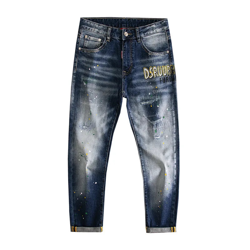 Jeans stampati con lettere di vernice splashate con foro rotto per pantaloni elastici a gamba dritta piccoli slim fit di marca di moda da strada da uomo