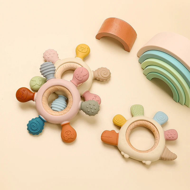 الكرتون ستيجوسورس الطفل حلقة خشبية سيليكون ألعاب التسنين سهلة الإمساك هدية الوليد BPA الحرة الملونة الرضع مضغ لعبة المولي