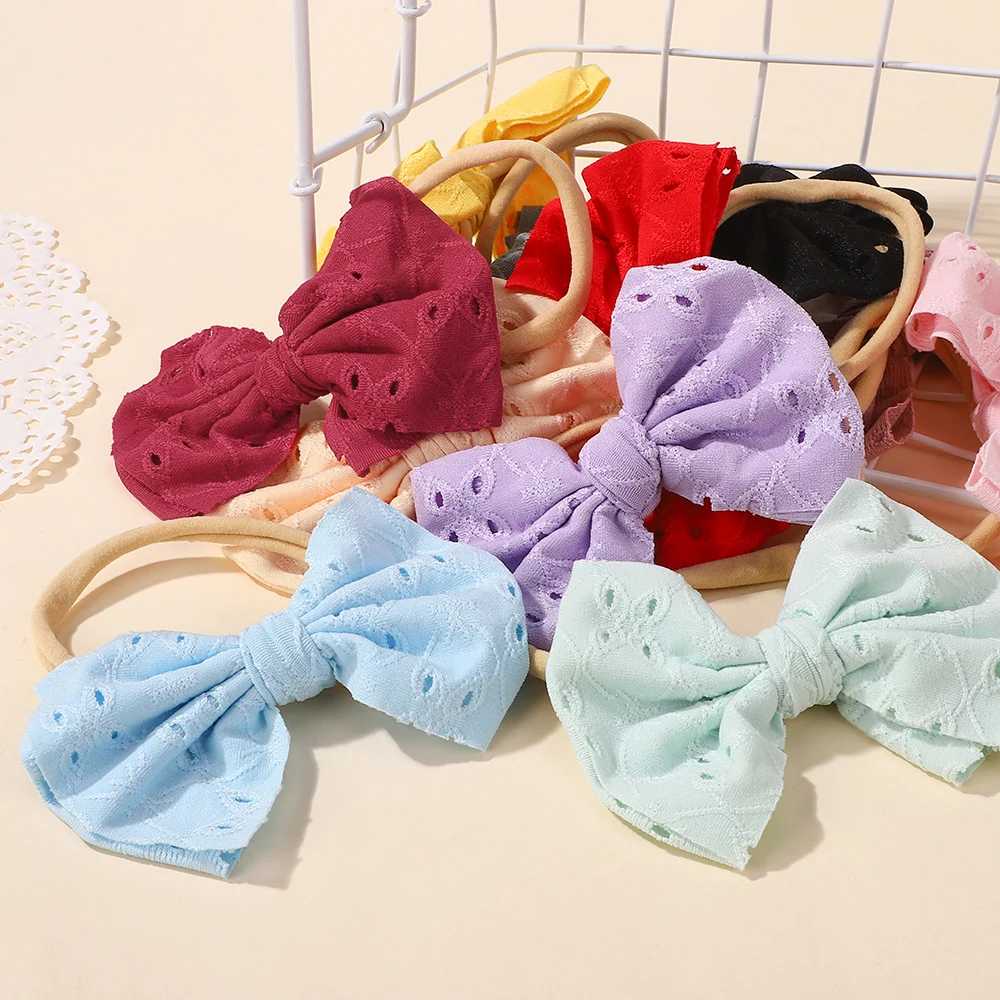 20 Teile/satz zufällige farbe haar bögen nylon stirnband große bögen Gestickte hohl bogen haarband Elastische nicht haar beschädigen headwear