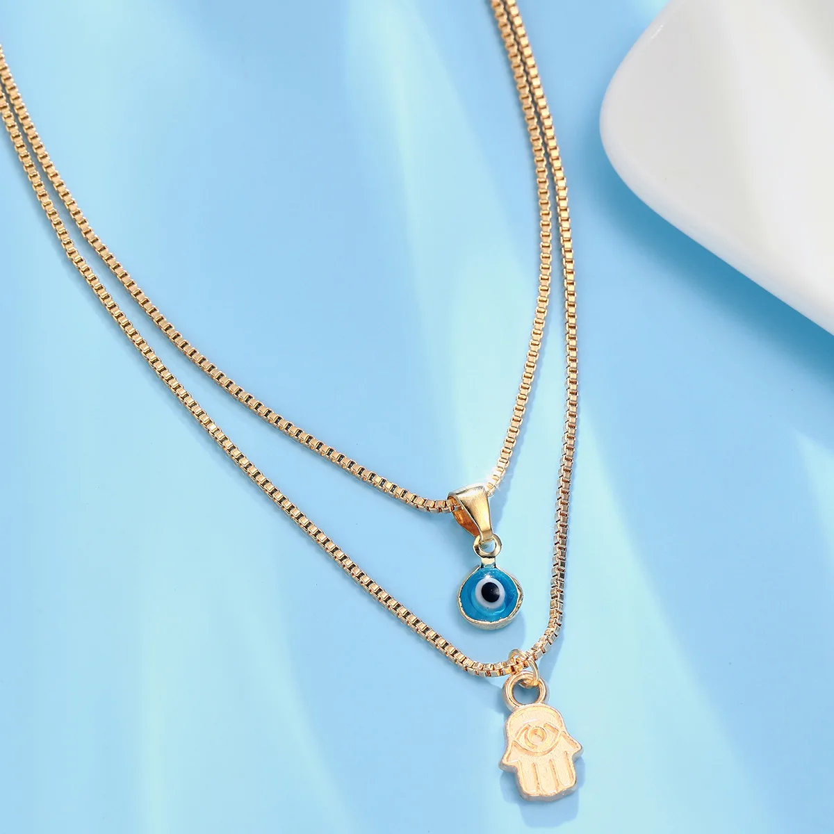 Mit Geschenkbox 2-teiliges Goldfarbenes Mehrlagiges Halsketten-Set für Frauen Böses Auge Hamsa-Hand Anhänger Vintage Boho Charm Schmuck Geschenk – Detail 9