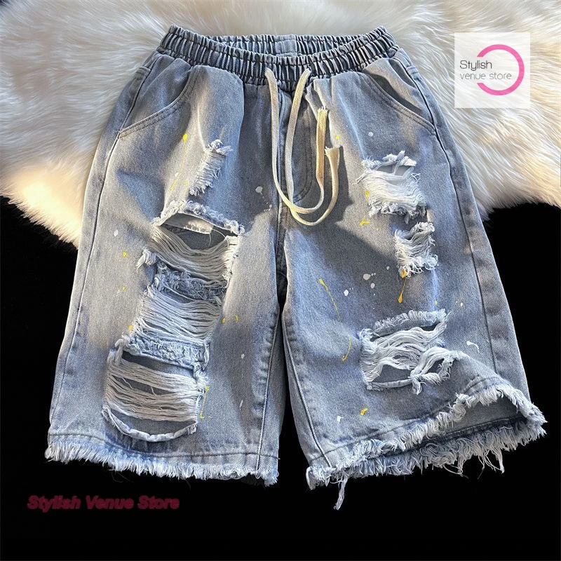 

Korean-style denim shorts with holes in raw edges for women's summer high street plus size loose street hip-hop paint pants.