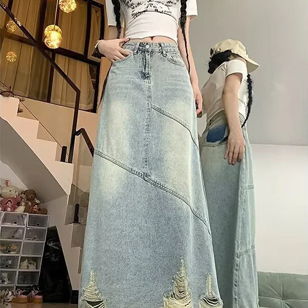 

Plus size retro hole denim skirt women's autumn and winter high waist fashion design loose long hip-wrapped A-word long skirt