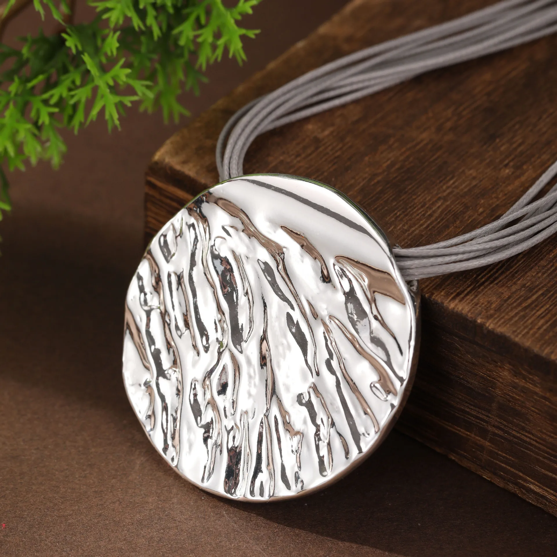 new smooth irregular disc leather rope magnetic attraction necklace, women's creative exaggerated disc small pendan