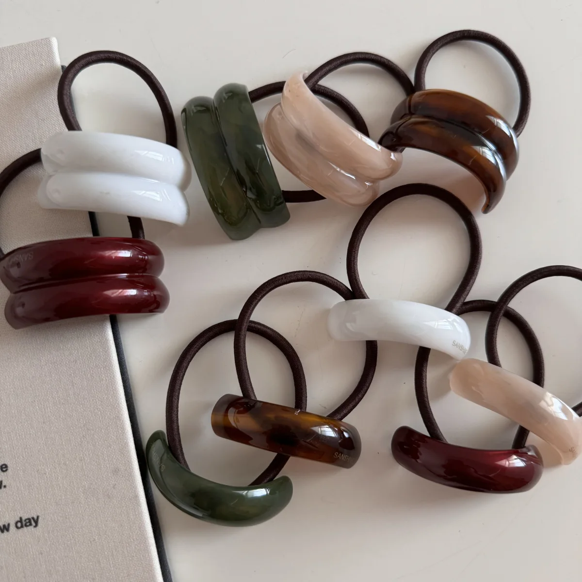 

Wholesale Retro Geometric Solid Color Curved Hair Cord Simple Temperament Plastic High Elastic Hair Rope Hair Accessosries