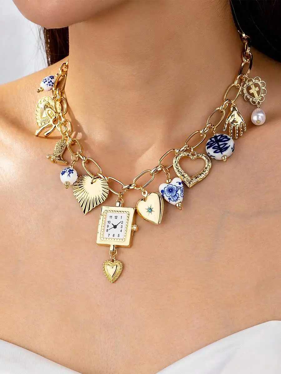 

Ожерелье с золотистыми подвесками в виде сердца, часов, жемчужин и керамических бусин, в стиле бохо