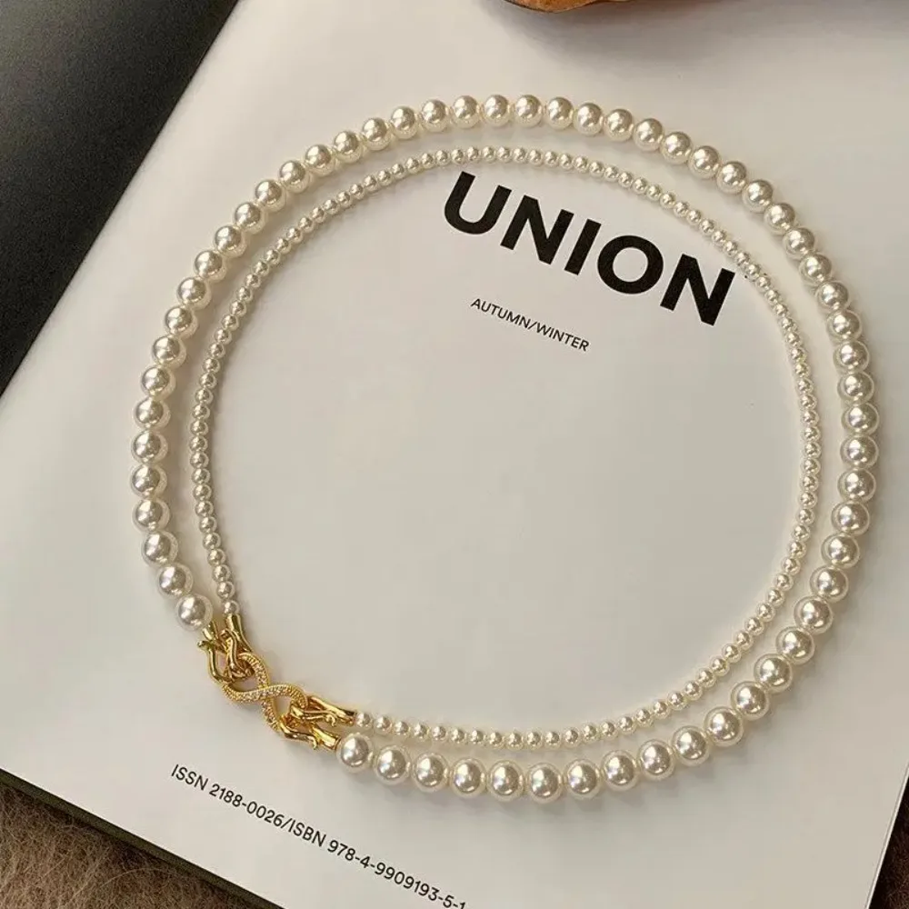 Elegant pearl double-layer necklace, exquisite collarbone chain, versatile accessories enhancing temperament, daily wear