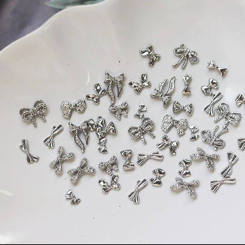 50/60Pcs/lot 3D Butterfly Alloy Nail Charms Bow-knot Design Jewelry Luxury Gold Silver Hollow Nail Art Decoration Accessory Bulk — zdjęcie 6