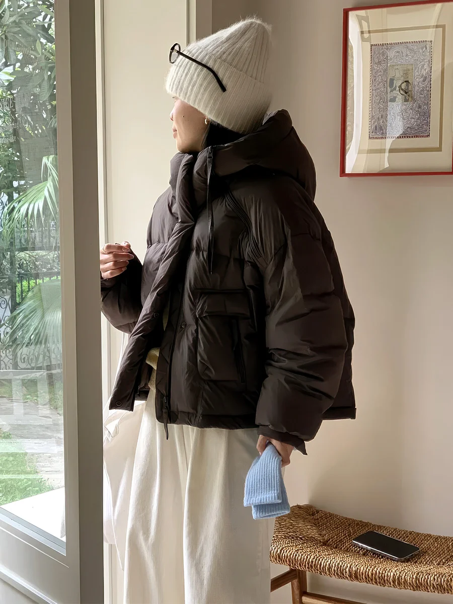 Dames witte winterjas met trendy kleur en hoedontwerp, warm en winddicht voor dagelijks gebruik.