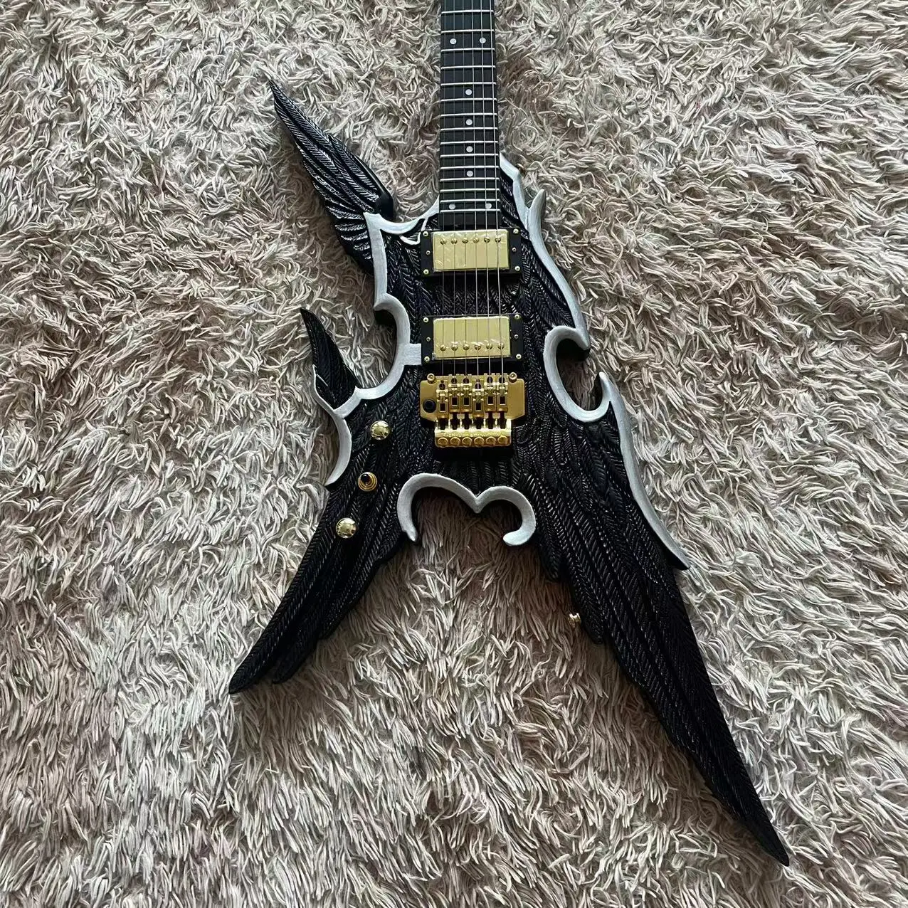 Guitar 6-string left-handed angel wing carved electric guitar, black body, gold accessories, factory real pictures, can be shipp