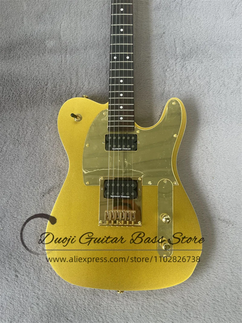 Golden Electric Guitar Solid Body Rosewood Fingerfrets Fixed Bridge Golden Mirror Pickguard Long Headstock Factory Custom