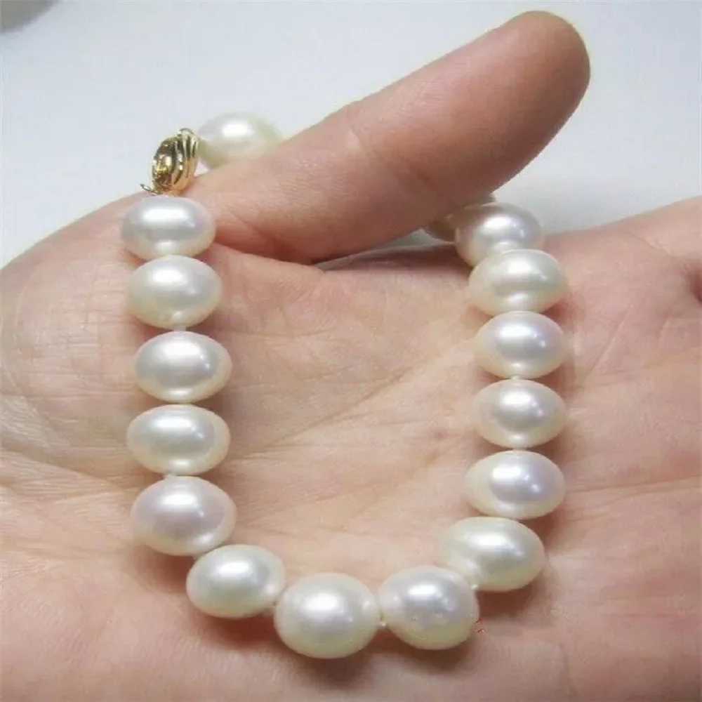 

Perfect South Sea AAA 11-10mm Round Pearl White Pearl Bracelet 7.5-8 inch 925s