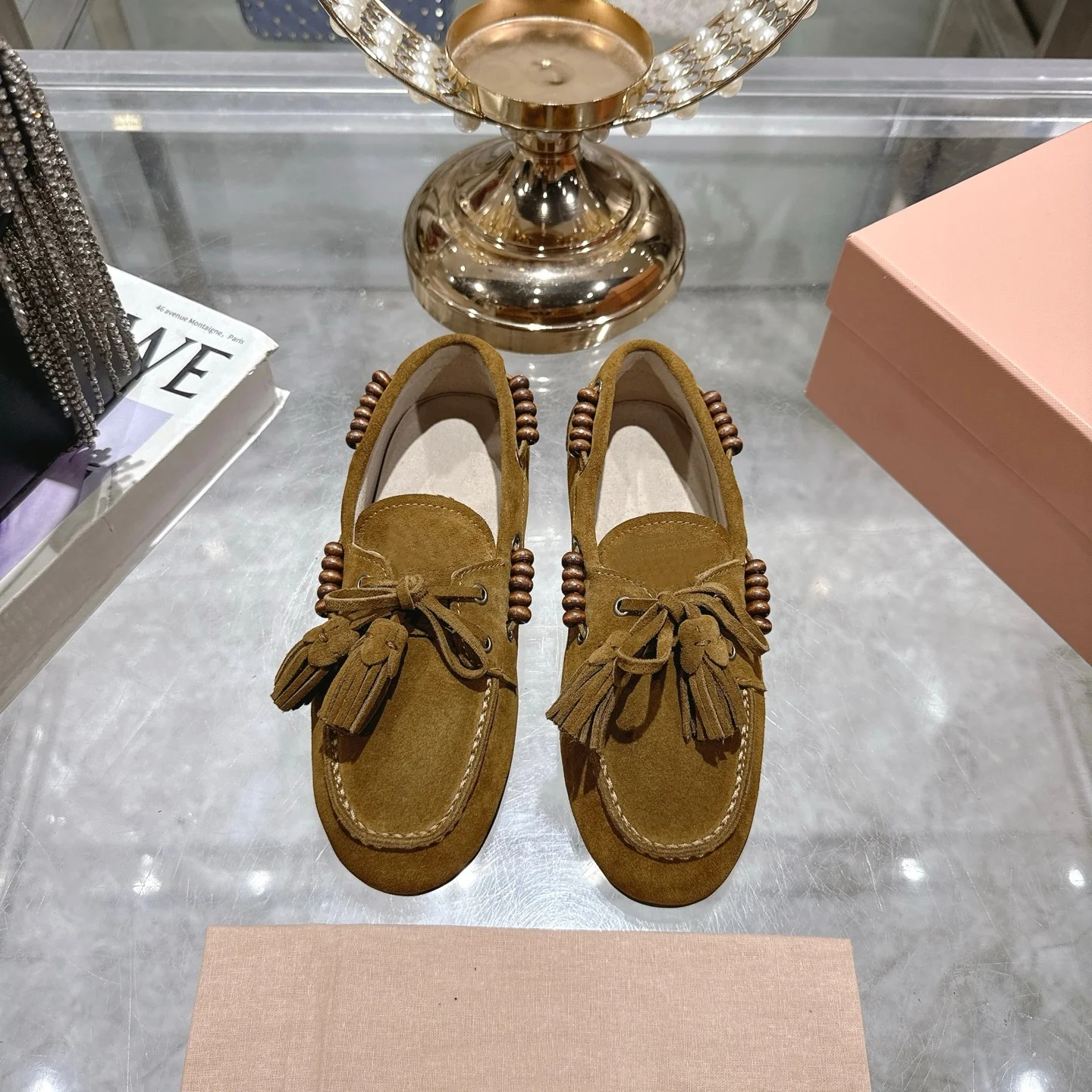 Mocasines planos con punta redonda de cuero genuino para otoño 2025, zapatos de mujer poco profundos con cordones y borlas cómodos y versátiles a la moda