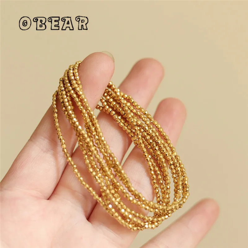 

Laser Bead Mini Golden Ball Elastic Bracelet Unlimited Hand Circumference for Women Girl Stainless Steel 18k Gold Plated Jewelry