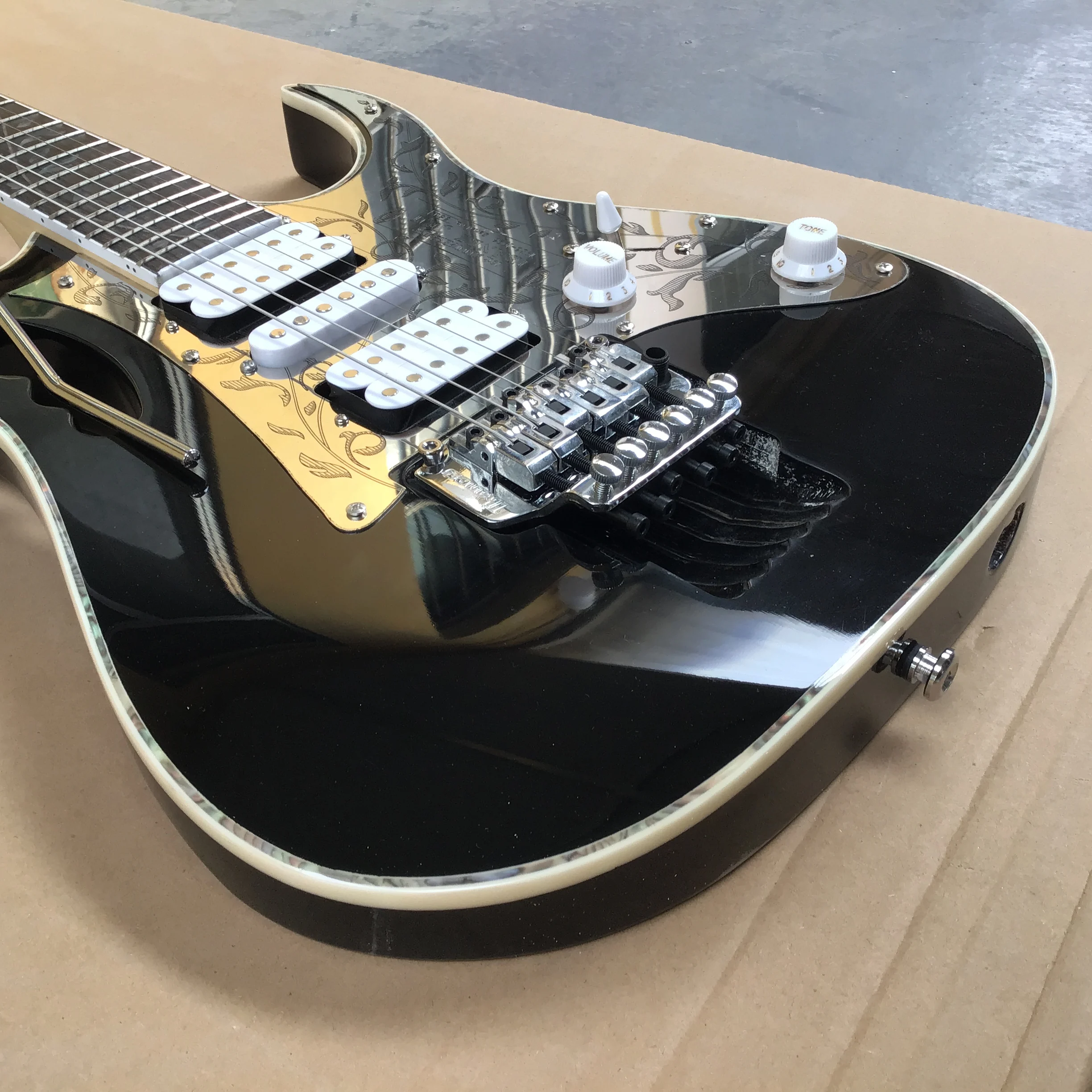 Black electric guitar, high gloss surface, metal carved protective plate, holiday gift guitar