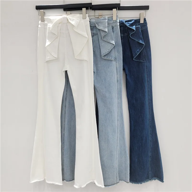 

K-Style Vintage High-Rise Jeans with 3D Bow. Slimming & Flared for a Chic, Sexy Look.