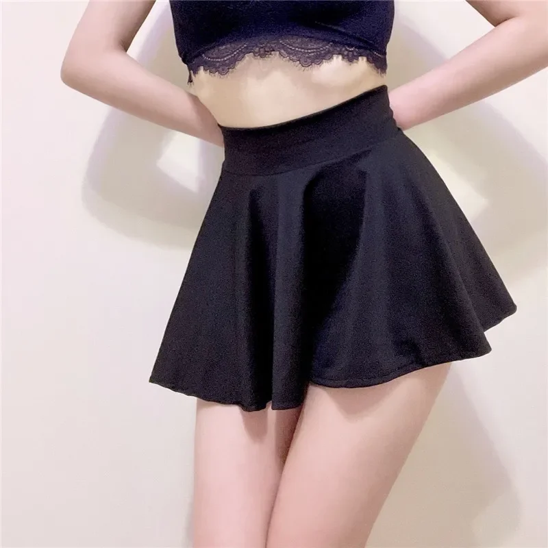 Falda plisada corta Sexy para mujer, minifaldas seductoras húmedas elásticas sin forro para baile, uniforme con tachuelas transpirable ultrafino para Cosplay