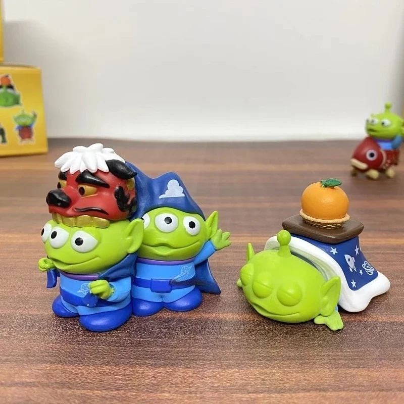 4.5-6 ซม.4 ชิ้น/เซ็ต Toy Story Alien Rex กอดมังกรเครื่องประดับน่ารักอุปกรณ์ต่อพ่วงภาพยนตร์ตุ๊กตาตกแต่งบ้านเดสก์ท็อปเครื่องประดับของขวัญ