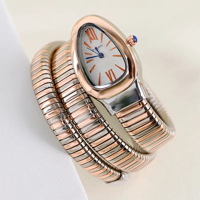 Golden serpentine quartz watch ladies fashion double-ring steel band watch Joker gradient bracelet watch winding