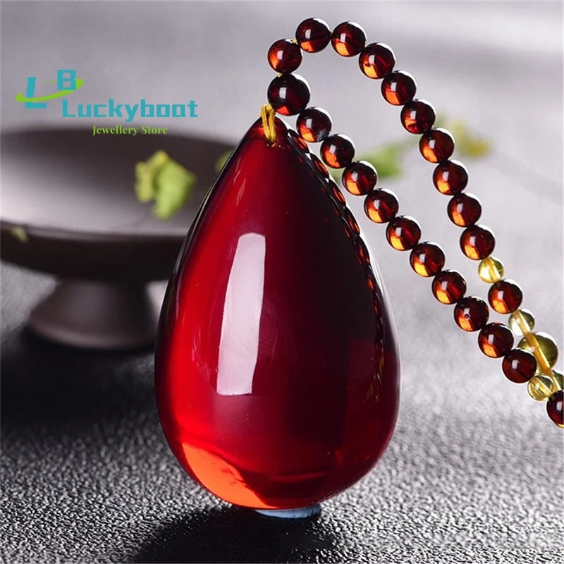 

Baltic Amber Blood Crimson Amber Water Drop Sweater Chain Raw Stone Beeswax Safety Pendant Necklace for Men and Women Dropship