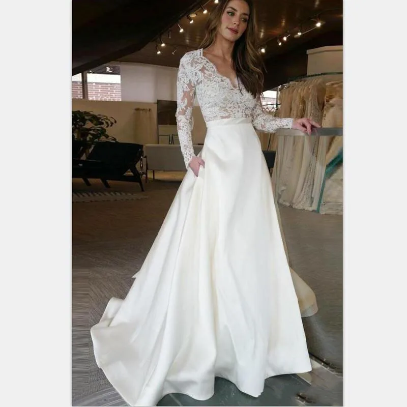 

Long Sleeve Wedding Dress 2022 V Neck A Line Appliques Lace Top Satin Skirt Wedding Gown with Pocket Custom Made Bride Dress