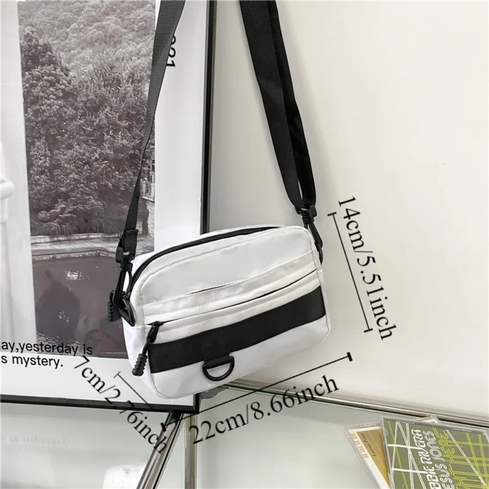 Bolsos cruzados informales ligeros para hombre, bolso deportivo portátil de estilo japonés para teléfono, bandolera de nailon con cremallera de Color sólido, Unisex