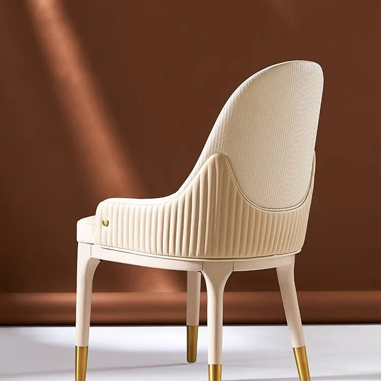 

High-end light luxury dining chair household high-end commercial backrest design large flat-floor villa luxury stone dining tabl