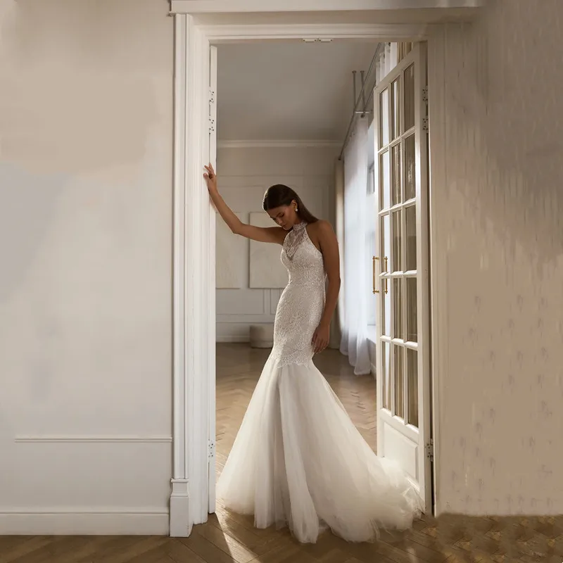 

Exquisite Lace Appliques Wedding Dress Ivory Mermaid Sleeveless Sequined Modern High Neck Bride Gowns Sexy Open Back Sweep Train