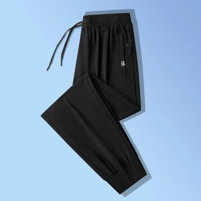 

2026 Men Thin Breathable Plus Size Sweatpants Summer Fashion Trend Ice Silk Quick Drying Casual Pants Male Taper Leg Trousers