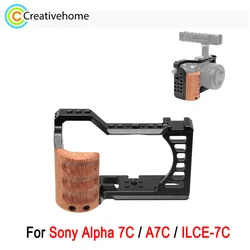 PULUZ Video Camera Cage For Sony Alpha 7C / ILCE-7C / A7C Camera Wood Handle Metal Stabilizer Rig Cage with 1/4 3/8 Screw Holes