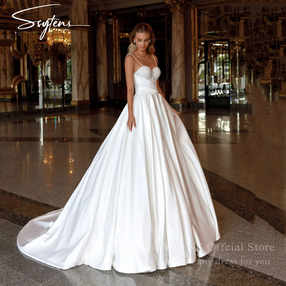 

SSYTENS Exquisite Wedding Dresses Bride Spaghetti strap Pearls Backless Satin Wedding Party Dress For Women 2025 Bridal Gowns