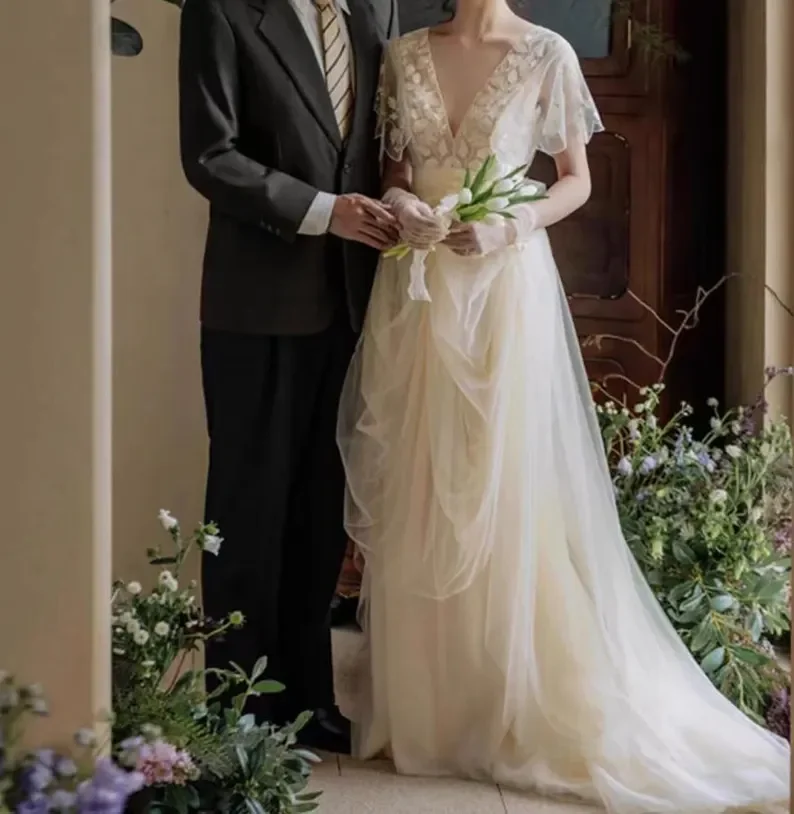 

Customized 2026 New Fashionable And Chic Rural Style Wedding Dress A-Line Wedding Dress Backless V-Neck Sexy Ball Bride Dress