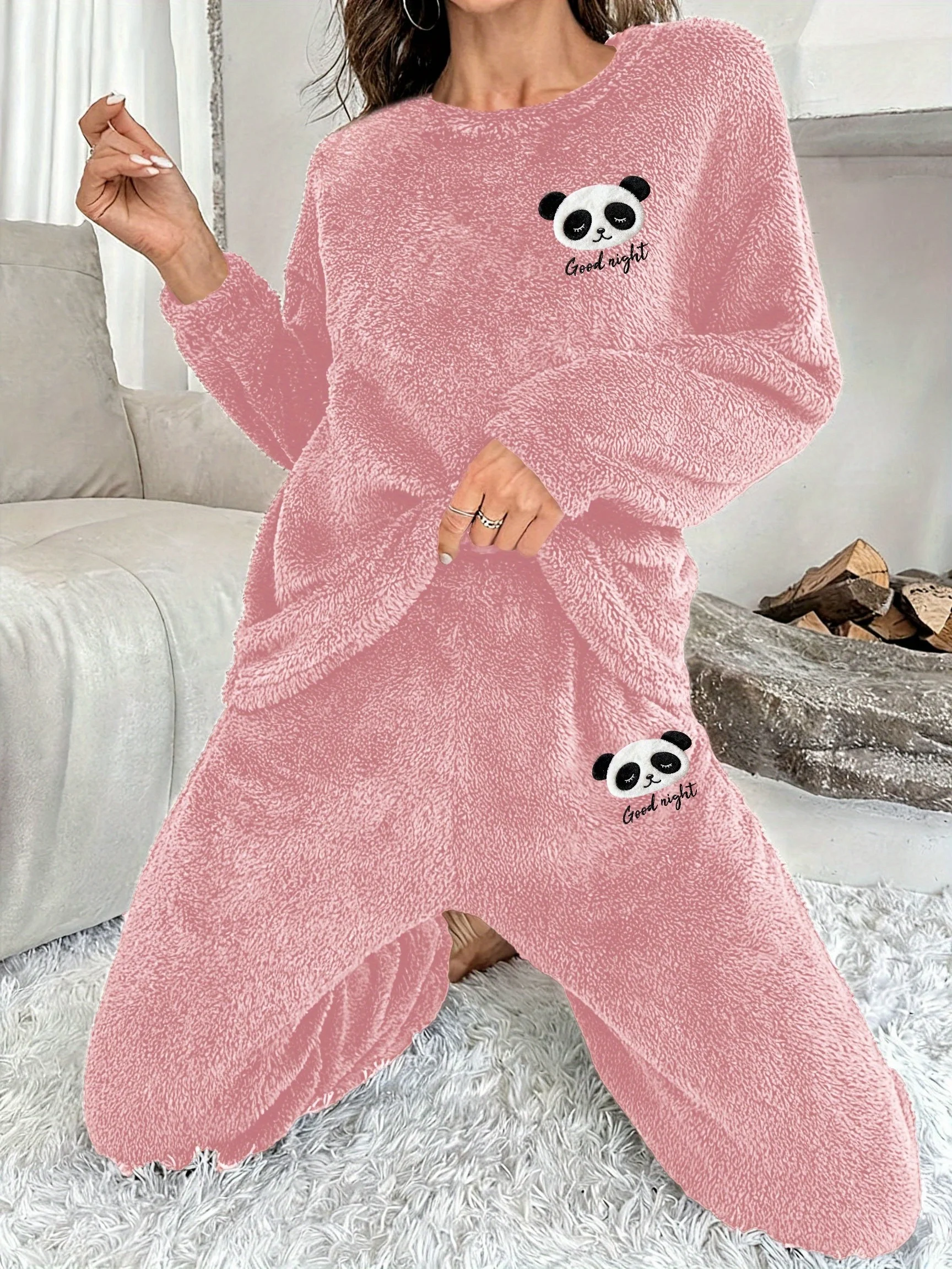 

Women's velvet pajama set, featuring a long-sleeve top and matching pants, comfortable winter sleepwear