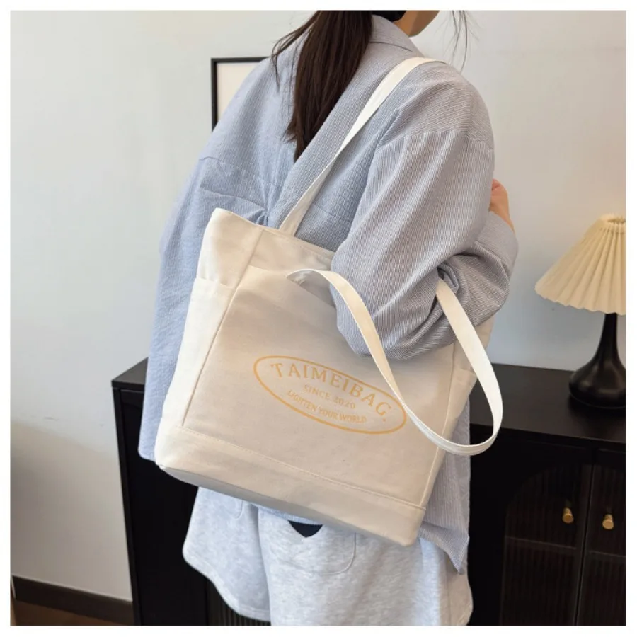 

Fashionable and trendy fabric bag, new versatile large-capacity single-shoulder bag, simple and stylish commuter tote bags