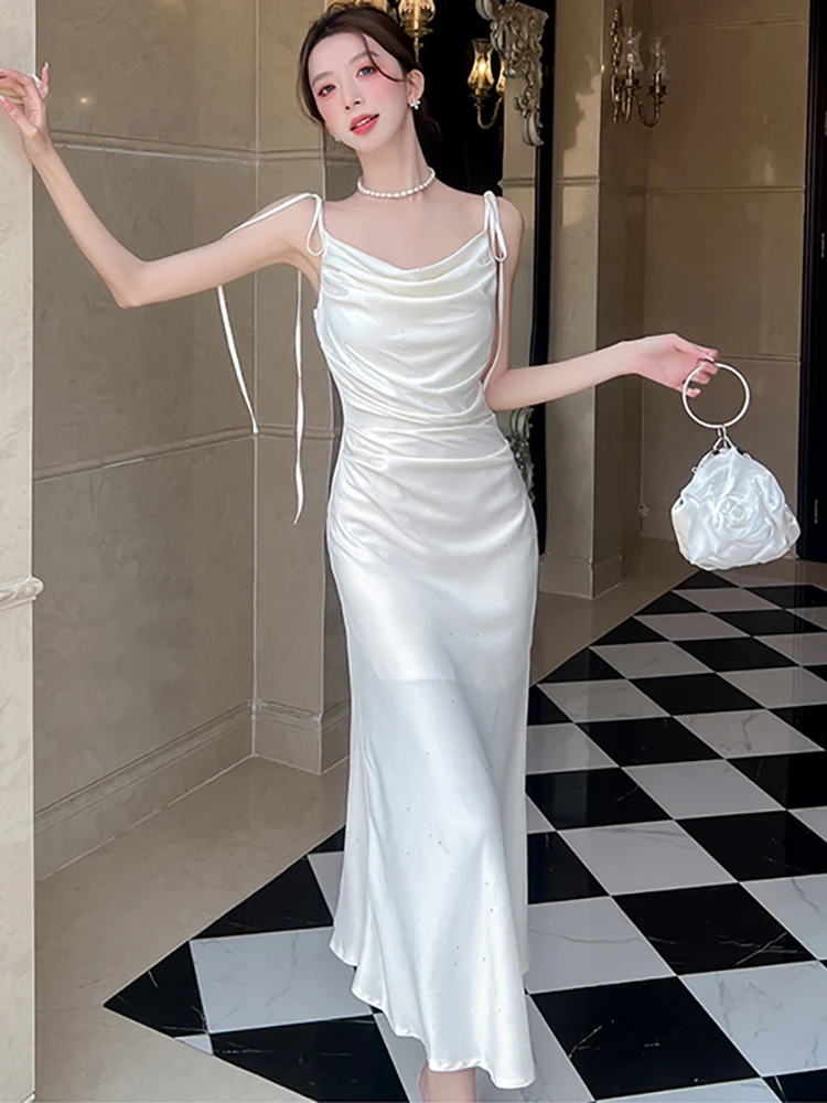 الصيف الأسود مشرق الحرير الساتان شيك القوس حبال مثير فستان طويل المرأة الكورية خمر فستان هيبورن 2025 أنيقة Bodycon فستان الحفلة الراقصة