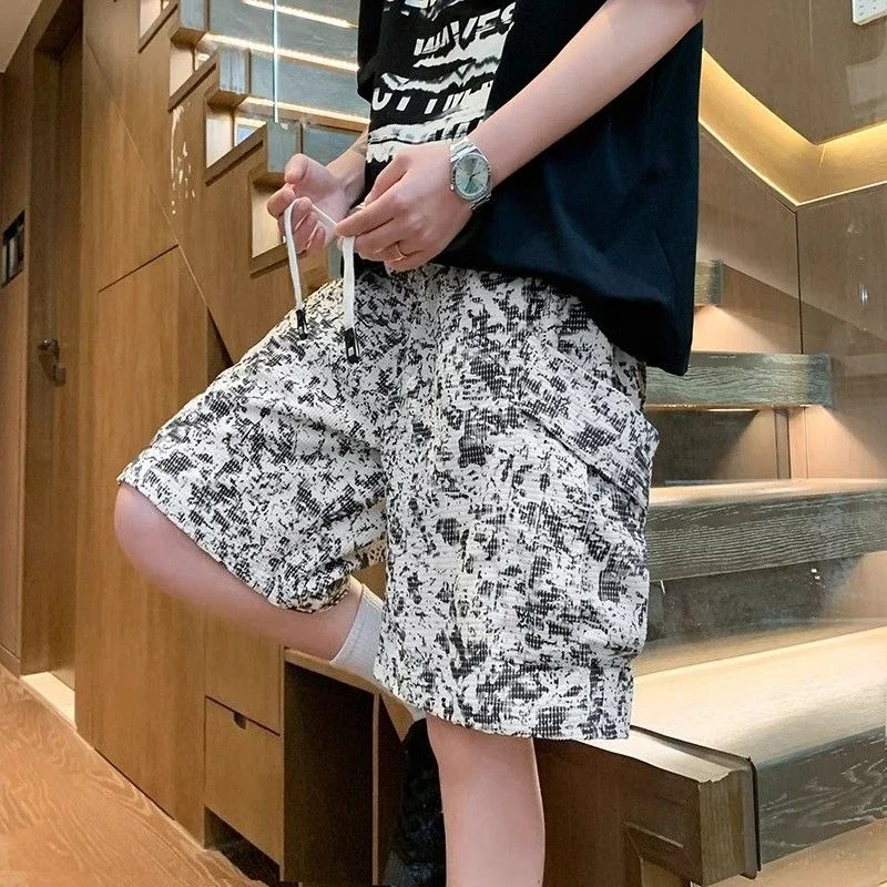 Pantalones cortos de gran tamaño para hombre, pantalones cortos largos holgados de talla grande para hombre, pantalones cortos Cargo con múltiples bolsillos, cintura media elástica, Bermudas negras holgadas nuevas