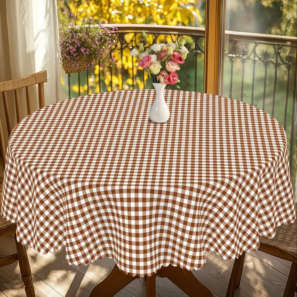 One beige and brown checkered tablecloth - a heavy rectangular table covering.