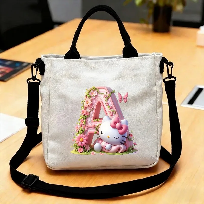 

Женская сумка через плечо Sanrio, сумка-тоут с принтом Hello Kitty и буквами A-Z, вместительная сумка через плечо, холщовая сумка для повседневного использования