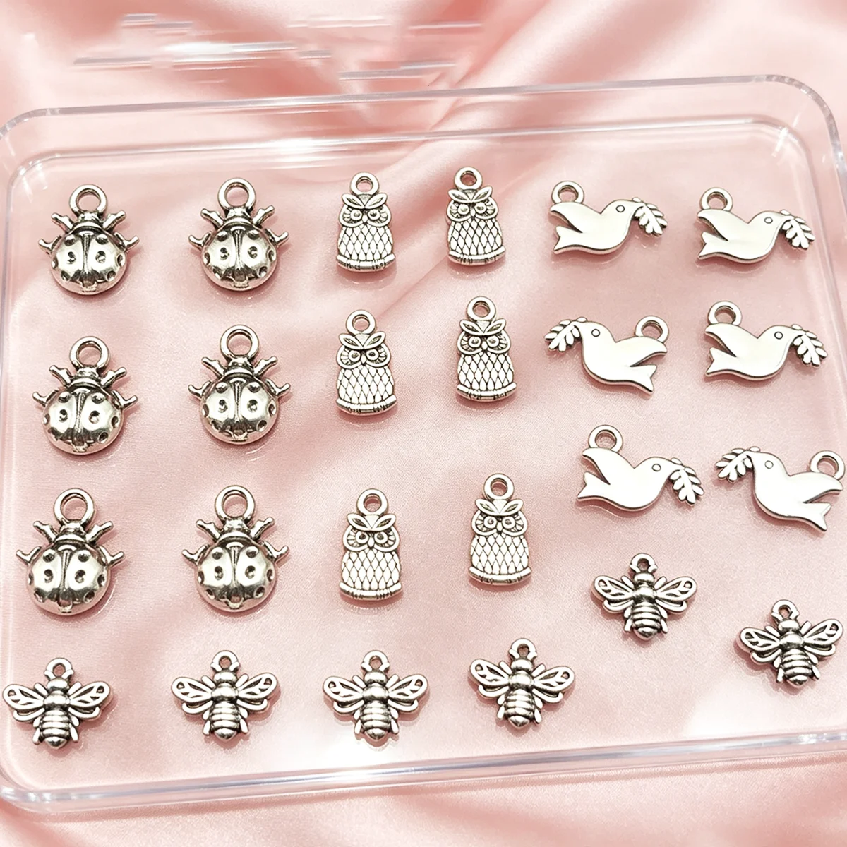 24-Piece Set of DIY Handmade Accessories, Featuring Seven-Star Ladybugs, Wood-Grain Owls, Peace Doves Holding Branches, and Little Bees in Various Designs, Suitable for DIY Bracelets, Necklaces, Earrings, Pendants, and Handmade Beaded Decoration Accessories