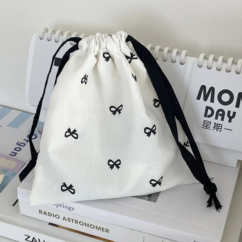 Borsa portaoggetti con fiocco coreano Canvas Sweet Kawaii Girl Artsy borsa con coulisse rossetto borsa per trucco portatile accessori per Organizer