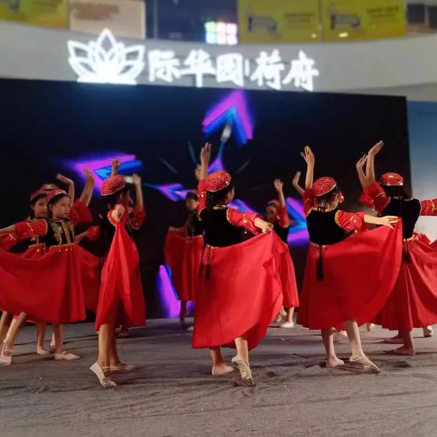 Costumi di danza uigura dello Xinjiang per ragazze Costume di danza popolare di minoranza nazionale antica Abbigliamento da ballo moderno per bambini