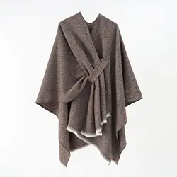 A woman's plain-colored shawl with stripes and a split imitation cashmere shawl cape