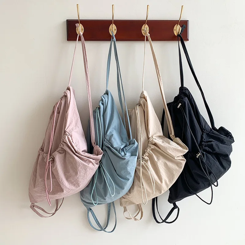 

Корейская версия, новый простой универсальный легкий студенческий рюкзак для девочек с нейлоновым карманным рюкзаком большой емкости на шнурке