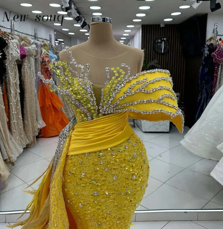 

Golden Mermaid Evening Dresses with Feathers Side Train Customized Arabic Formal Sparkly Crystals Pageant Events Party Gowns