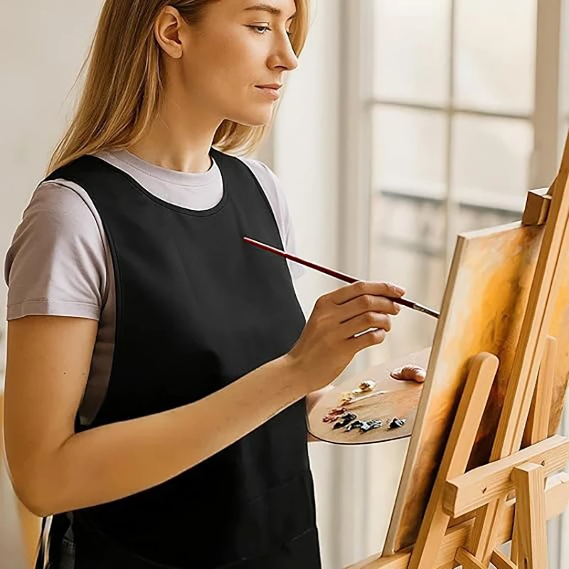 

Легкий черный фартук с 2 глубокими карманами, регулируемыми завязками, идеально подходит для готовки, уборки и работы в салоне красоты.